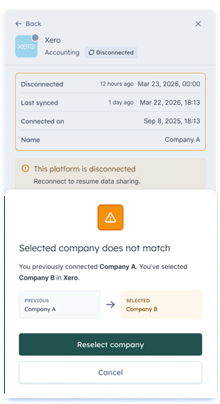 A warning in Link showing that the selected company does not match the previously connected company, with options to reselect or cancel